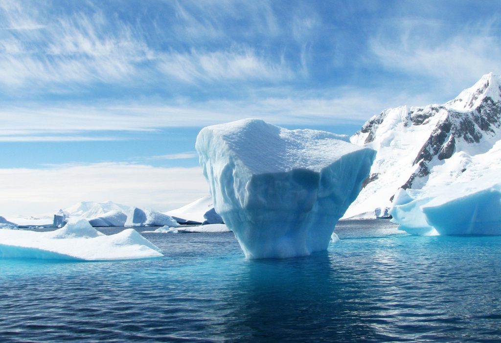 Antarctic solar eclipse, iceberg, Antarctica 